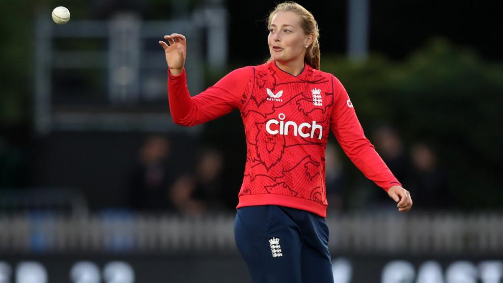 England bowler Sophie Ecclestone catches a ball