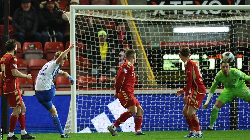 David Watson scores to make it 1-0 to Kilmarnock during a cinch Premiership match between Aberdeen and Kilmarnock at Pittodrie Stadium