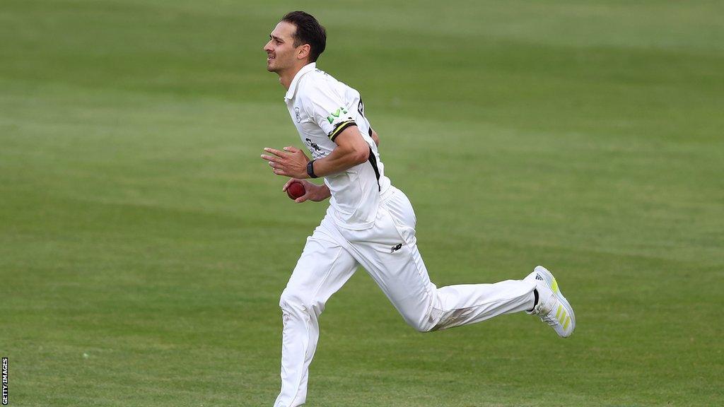 Zaman Akhter bowling for Gloucestershire