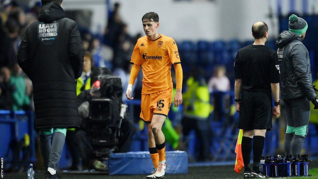 Tyler Morton walking off after being sent off