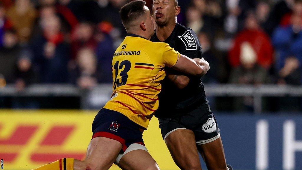 James Hume tackles Gael Fickou