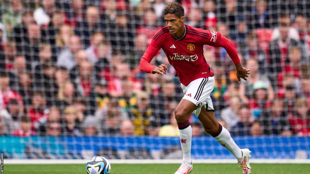 Raphael Varane runs with the ball