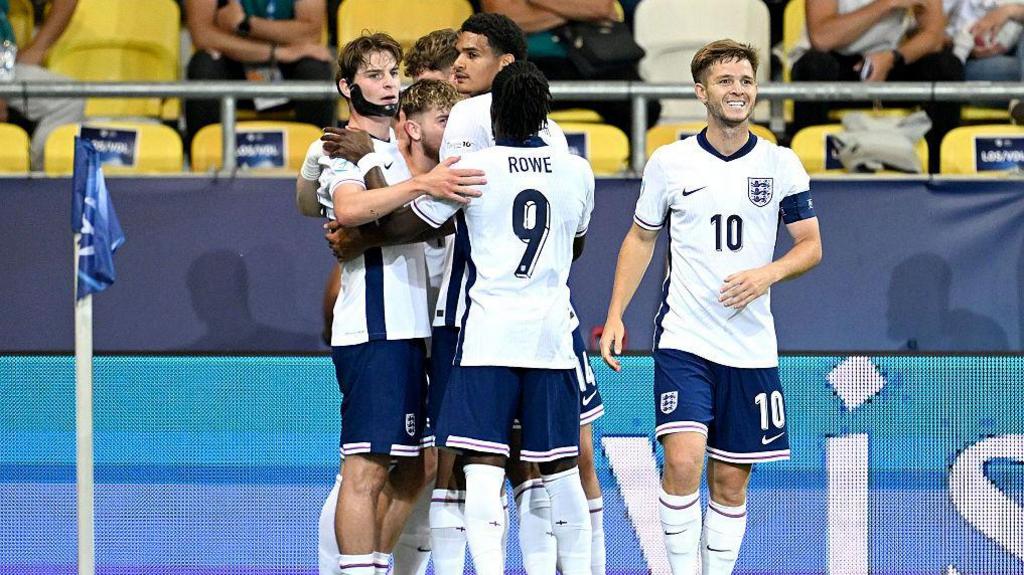 England's players celebrating after scoring against the Czech Republic