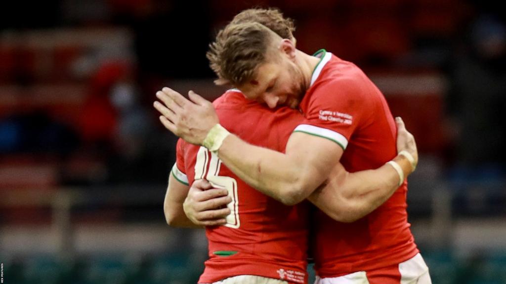 Wales' Leigh Halfpenny and Dan Biggar celebrate after beating Ireland