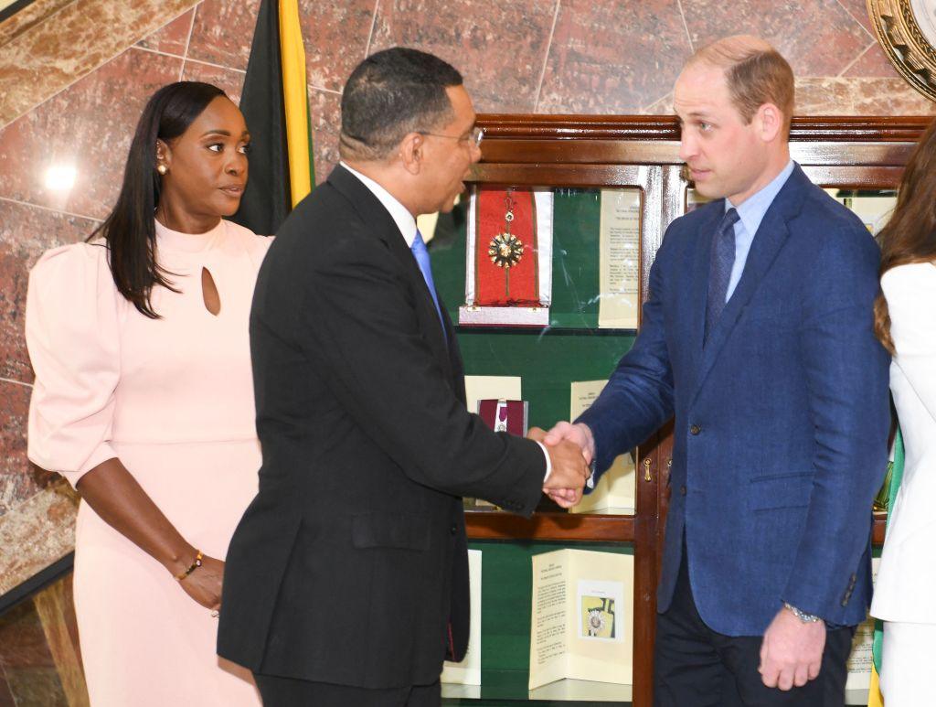 Prince William (right) meeting Prime Minister Holness (centre) and his wife Juliet (left)