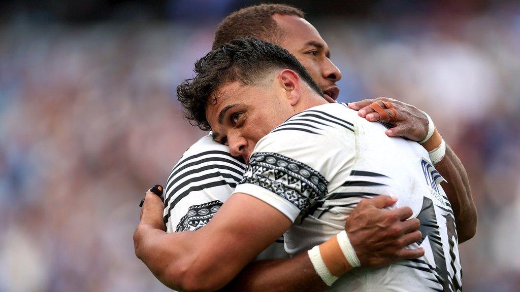 Fiji's Caleb Muntz and Teti Tela celebrate after the win over England