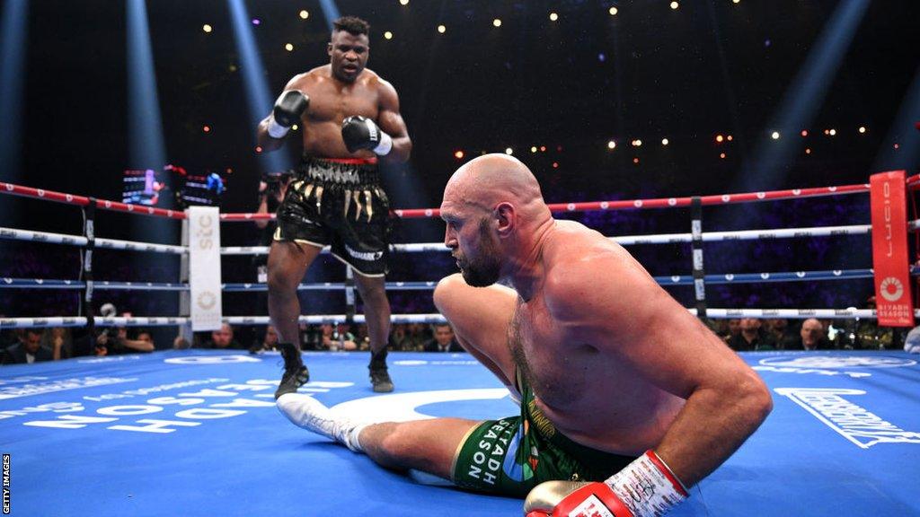 Francis Ngannou taunts Tyson Fury after knocking him down during their heavyweight boxing fight in October