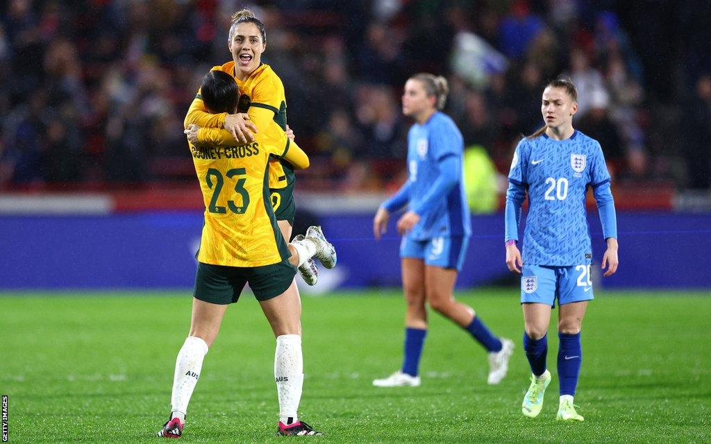 Australia celebrate after beating England at Brentford's stadium