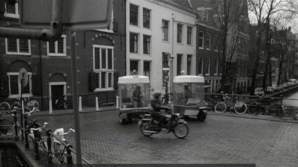 Electric cars driving on the roads in Amsterdam