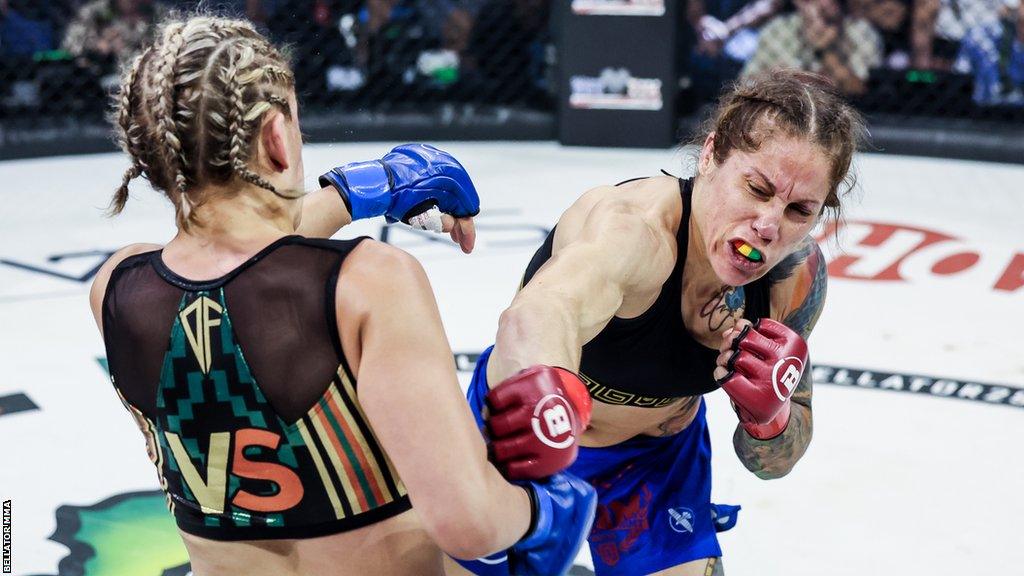 Liz Carmouche misses a punch against DeAnna Bennett