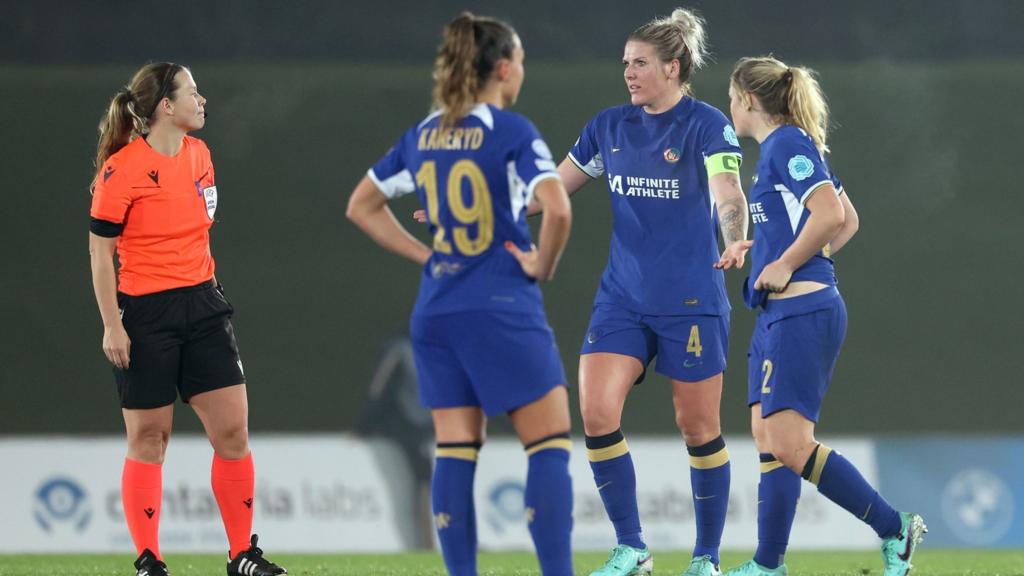 Millie Bright protests at the referee