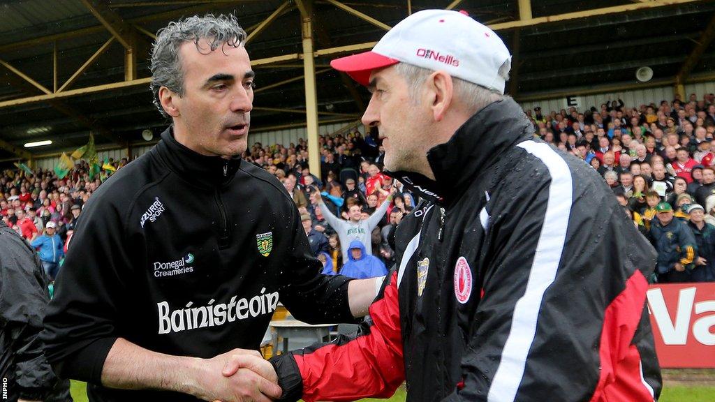 Jim McGuinness and Mickey Harte at the final whistle of the 2013 Ulster Championship quarter-final