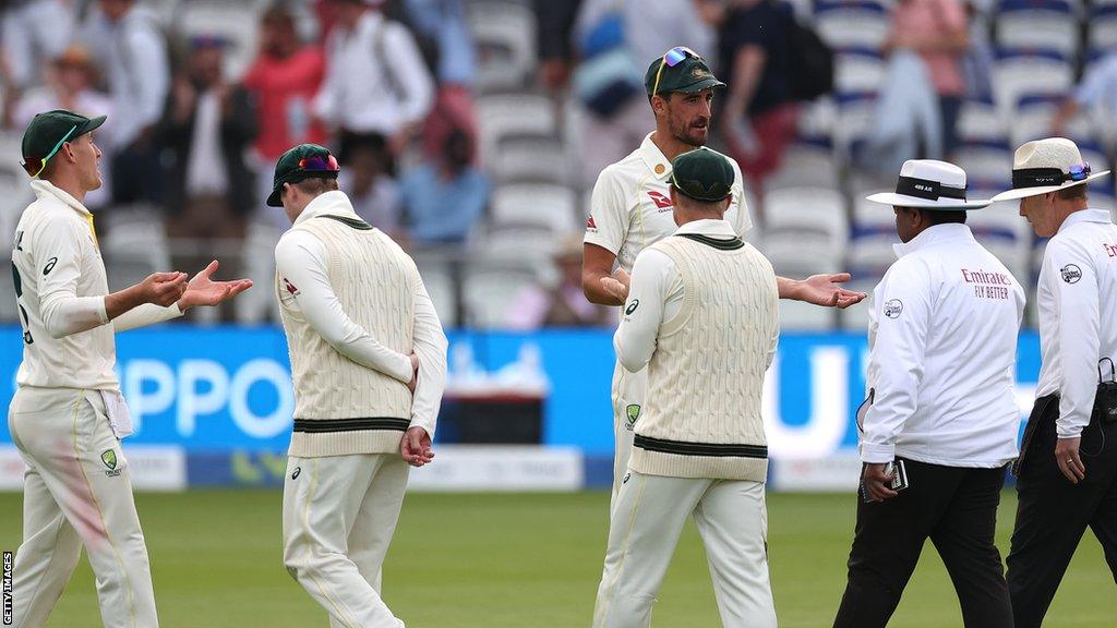 Mitchell Starc discusses catch with umpires