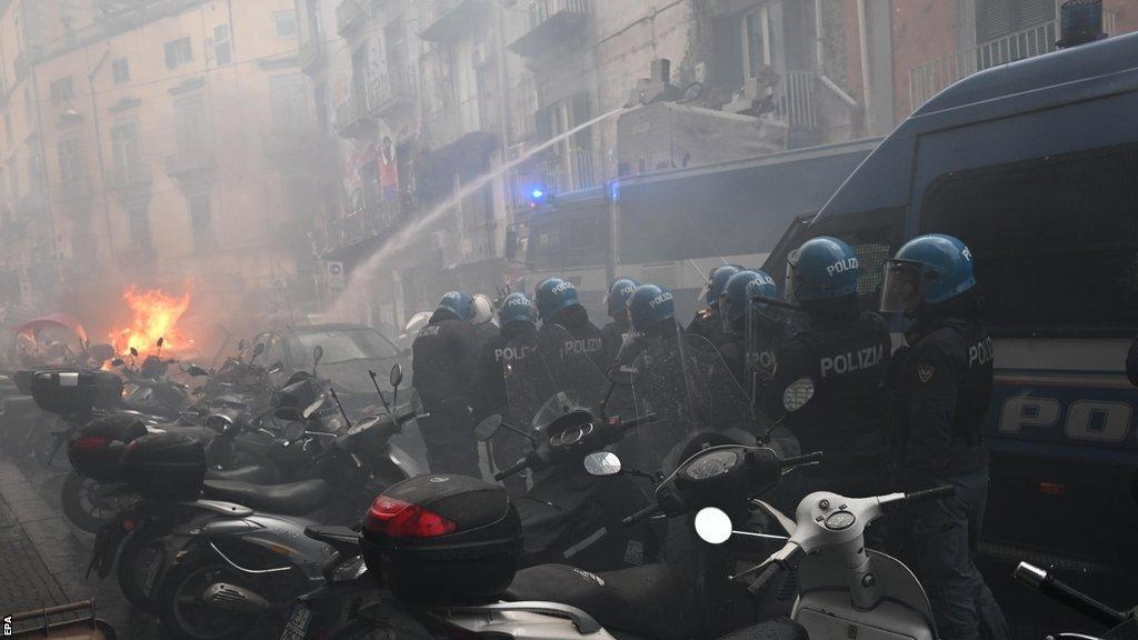 Police and damage in Naples