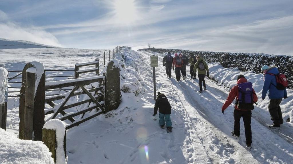 Ramblers embraced the cold on the Pennine Way in the High Peak area of the Peak District.