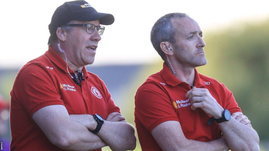 Feargal Logan and Brian Dooher on the sidelines