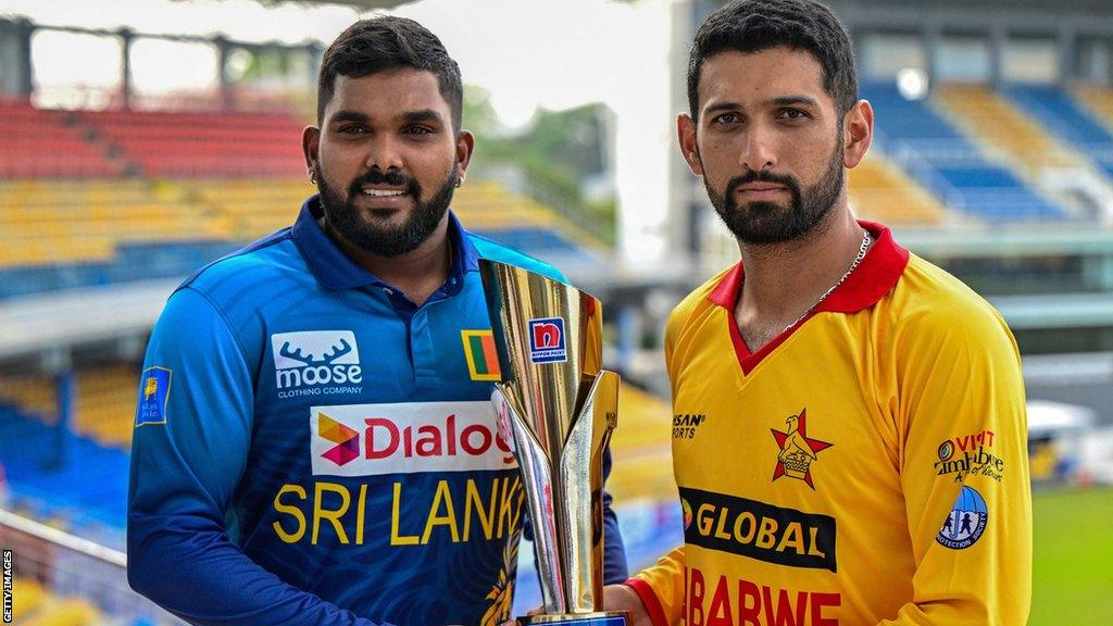 Sri Lanka captain Wanindu Hasaranga and Zimbabwe skipper SIkander Raza with the T20 series trophy