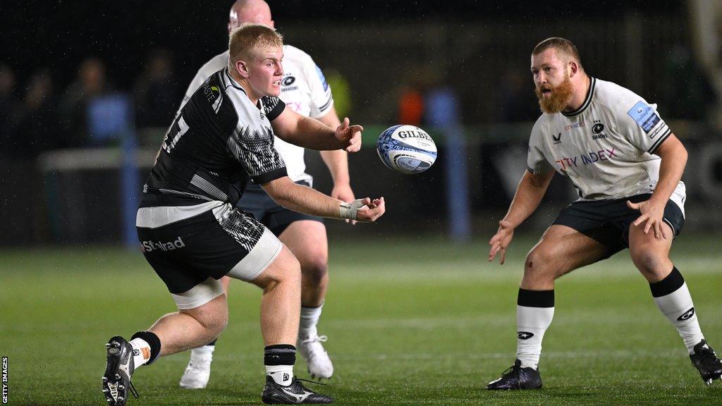 Phil Brantingham (left) playing for Newcastle