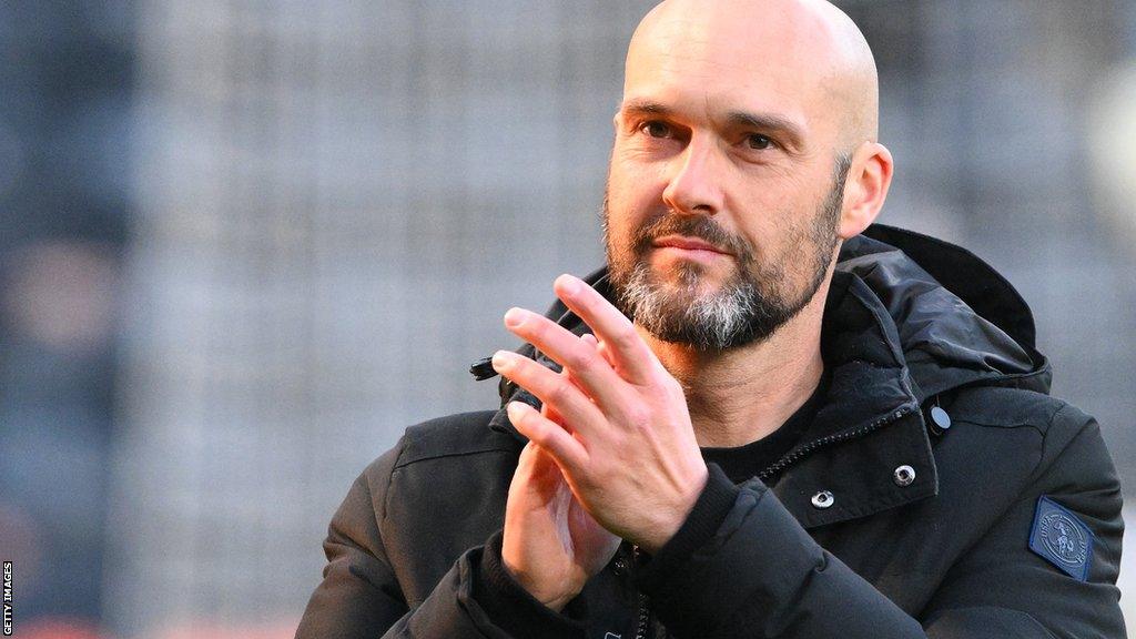 Notts County boss Luke Williams claps the fans after a game