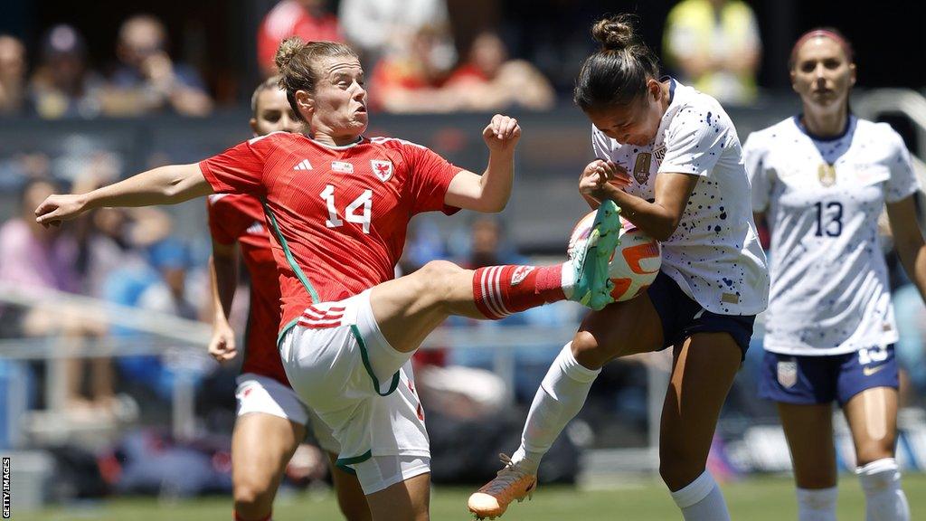 Wales centre-back Hayley Ladd makes a vital intervention to deny Alyssa Thompson a run through on Olivia Clark's goal