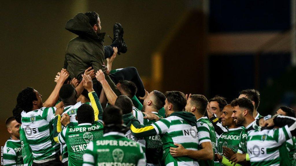 Sporting CP players celebrate with coach Ruben Amorim