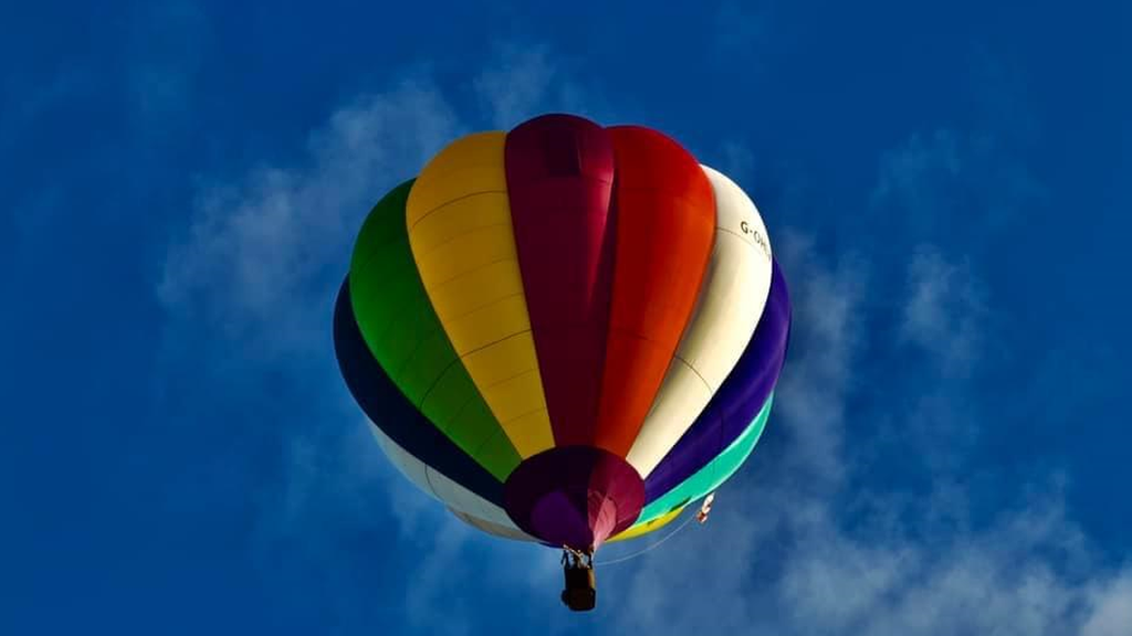 A hot air balloon flying in the sky