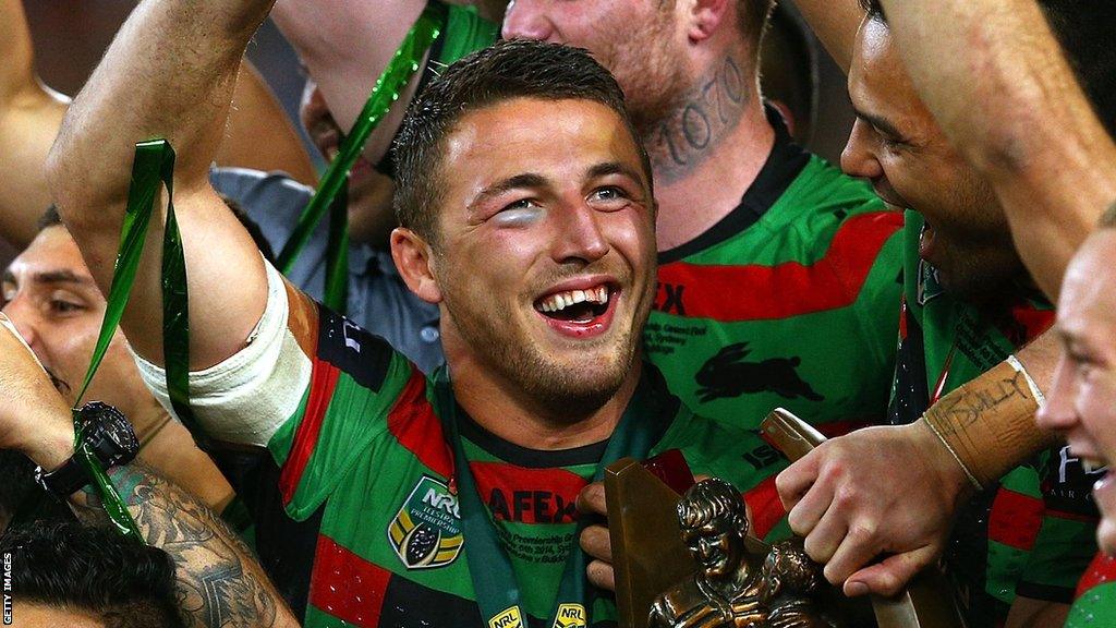 Sam Burgess celebrates the 2014 title win with Souths