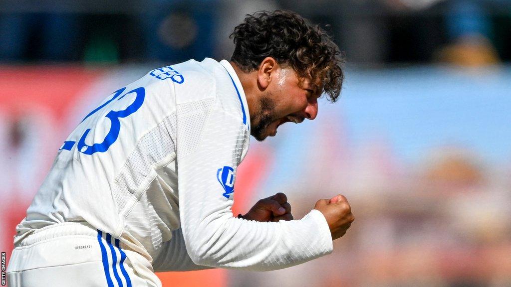 India spinner Kuldeep Yadav celebrates taking the final wicket in victory over England