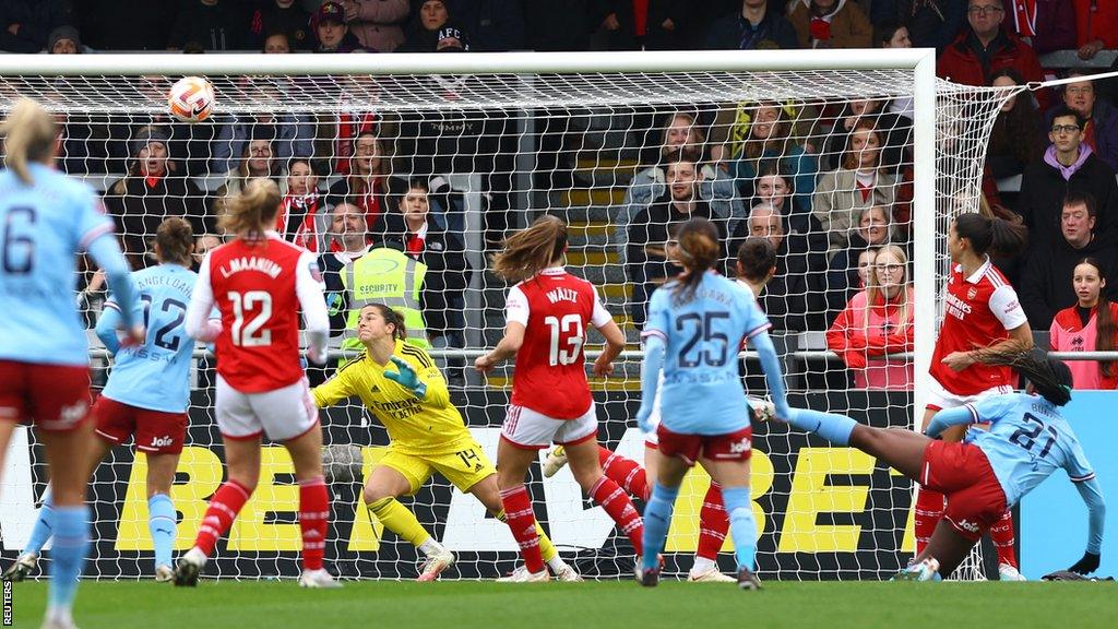 Manchester City's Khadija Shaw scores their first goal at Arsenal