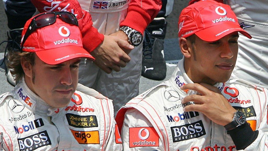 Fernando Alonso and Lewis Hamilton sit together