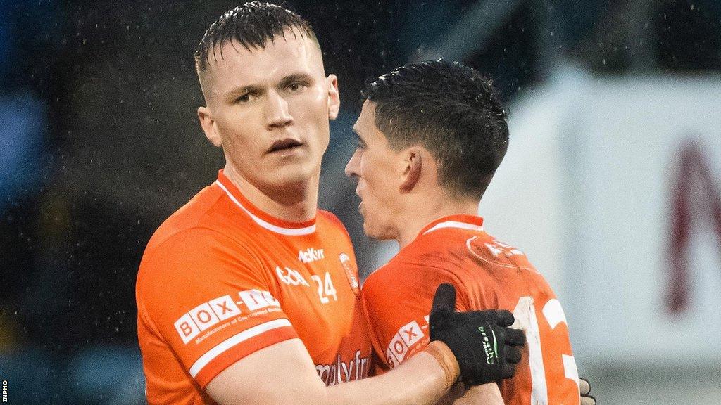 Rian O'Neill with Rory Grugan after Armagh's win over Cavan last weekend