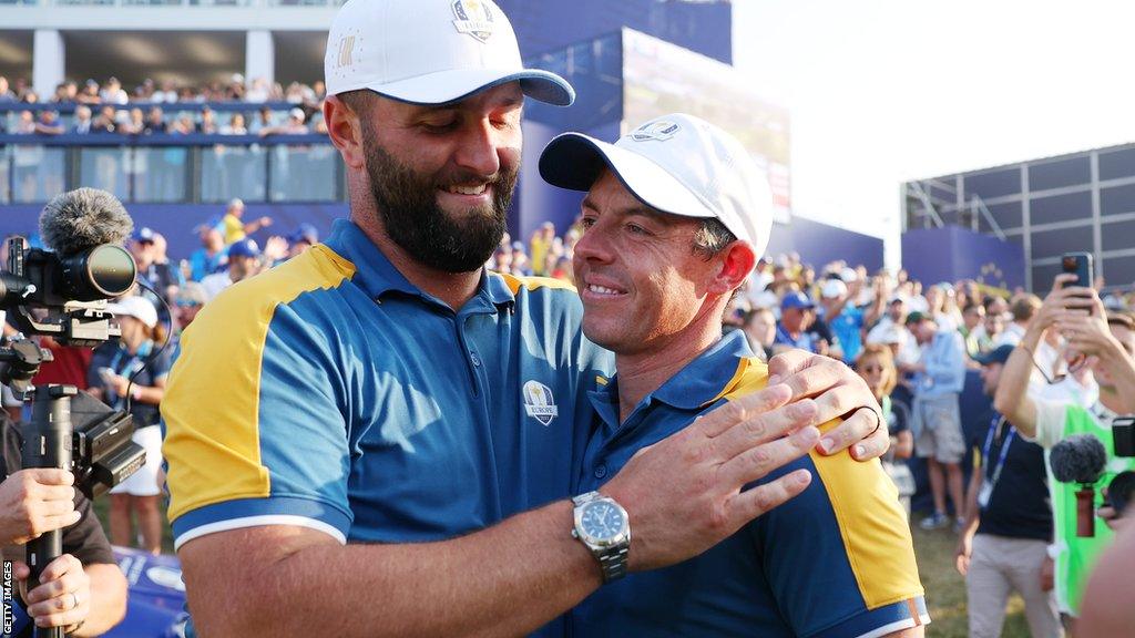 Jon Rahm of Spain and Rory McIlroy of Northern Ireland