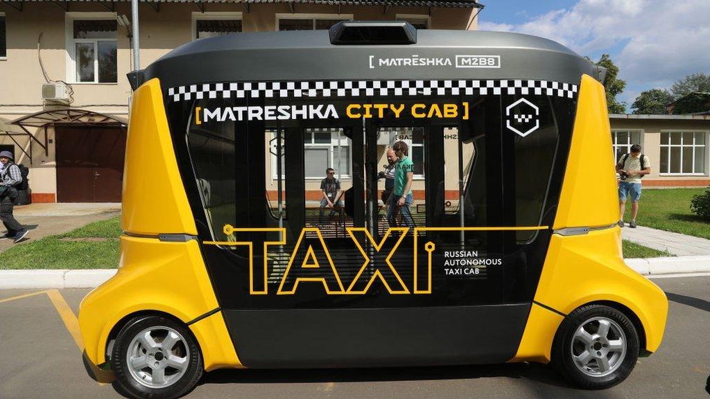 A Matreshka self-driving taxi cab performs a test drive at the first autonomous transport training ground at the Kalibr technopark