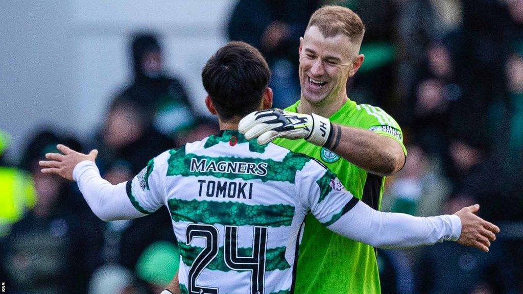 Celtic's Tomoki Iwata and Joe Hart embrace