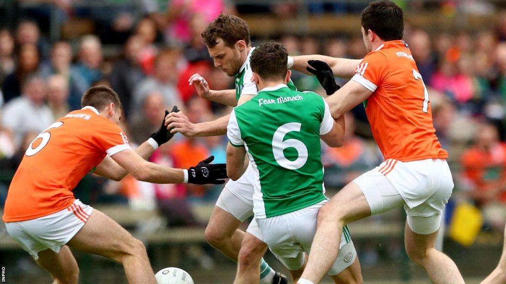 Armagh's Greg McCabe and Aidan Forker battle with Fermanagh's Declan McCusker and James McMahon in the 2019 Ulster Championship game at Brewster Park