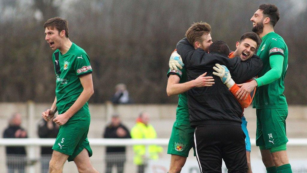 Nantwich Town players celebrate their FA Trophy quarter-final winner over Dover Athletic