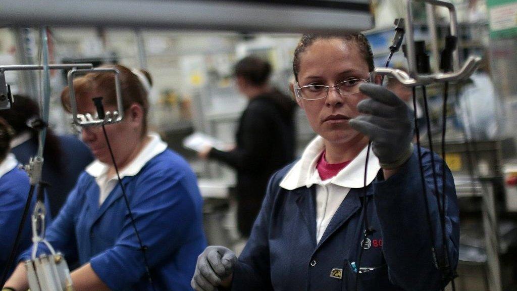 Workers in the auto parts production line of the Bosch factory in San Luis Potosi, Mexico