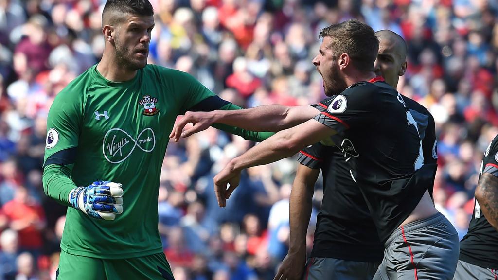 Forster celebrates saving Milner's penalty