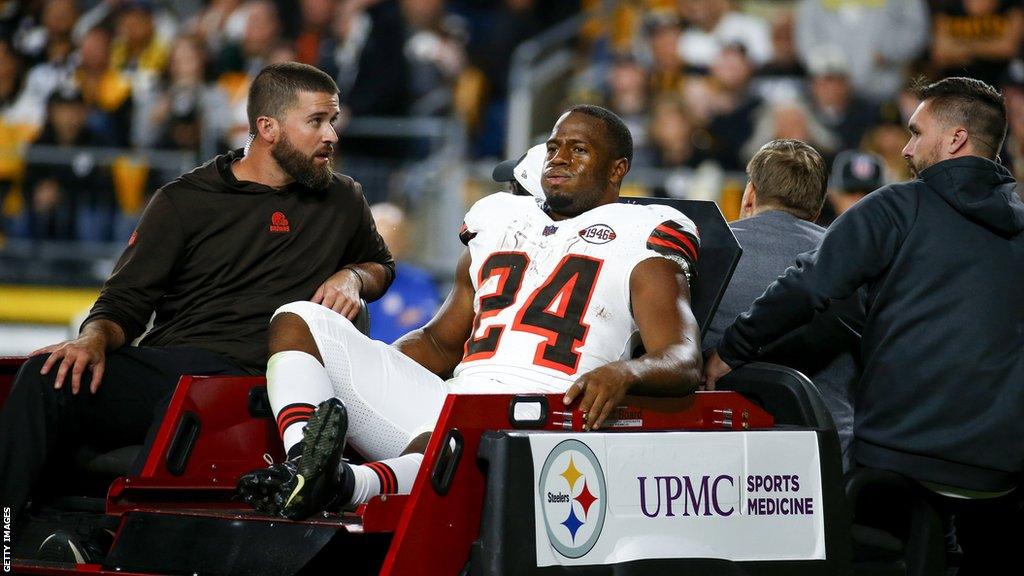 Nick Chubb being carted off the field