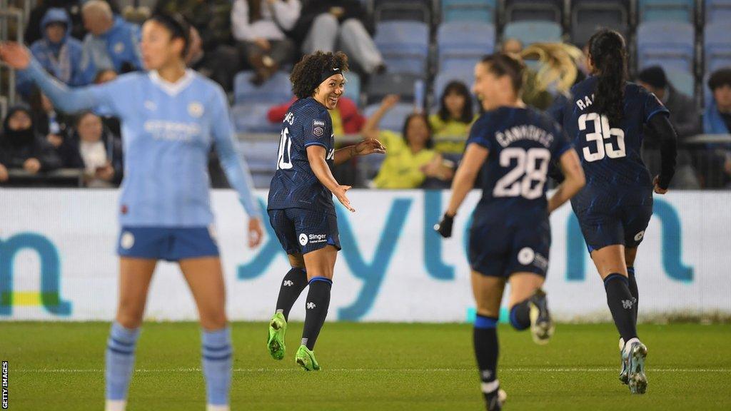 Chelsea celebrate after Lauren James scores against Manchester City