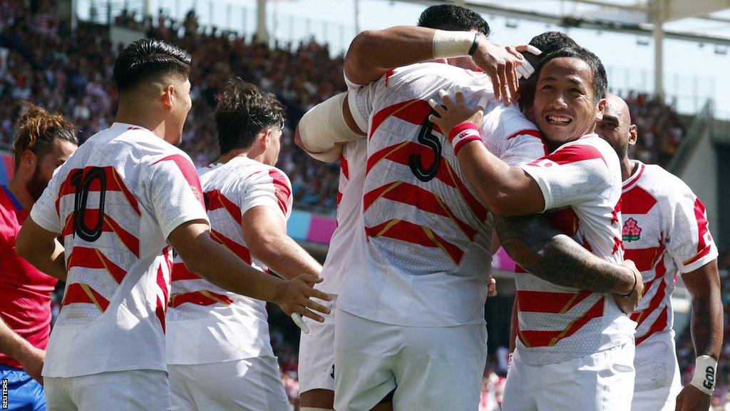 Japan celebrate a try against Chile