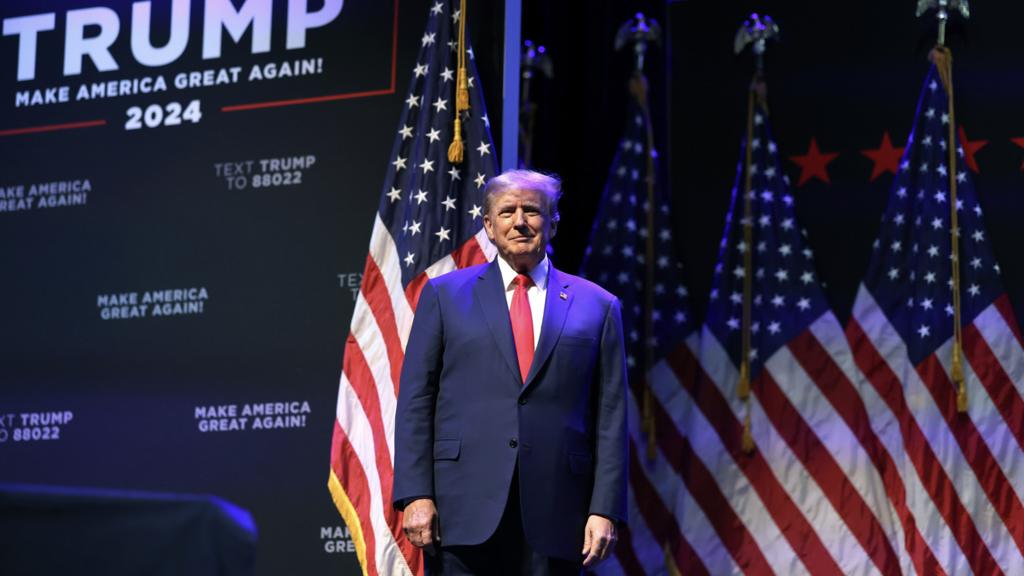 Donald Trump arrives for an event at the Adler Theatre on 13 March 2023 in Davenport, Iowa.