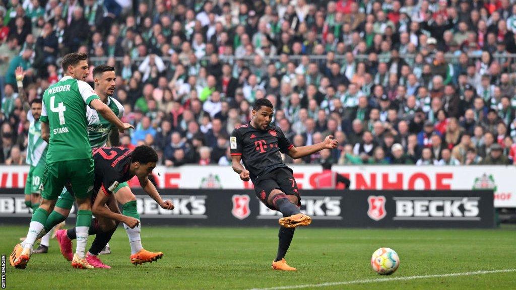 Serge Gnabry scores the opening goal for Bayern Munich in their victory against Werder Bremen