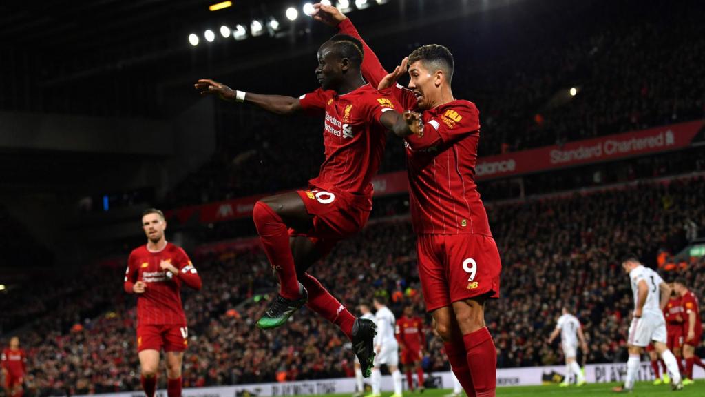 Mane and Firmino celebrate