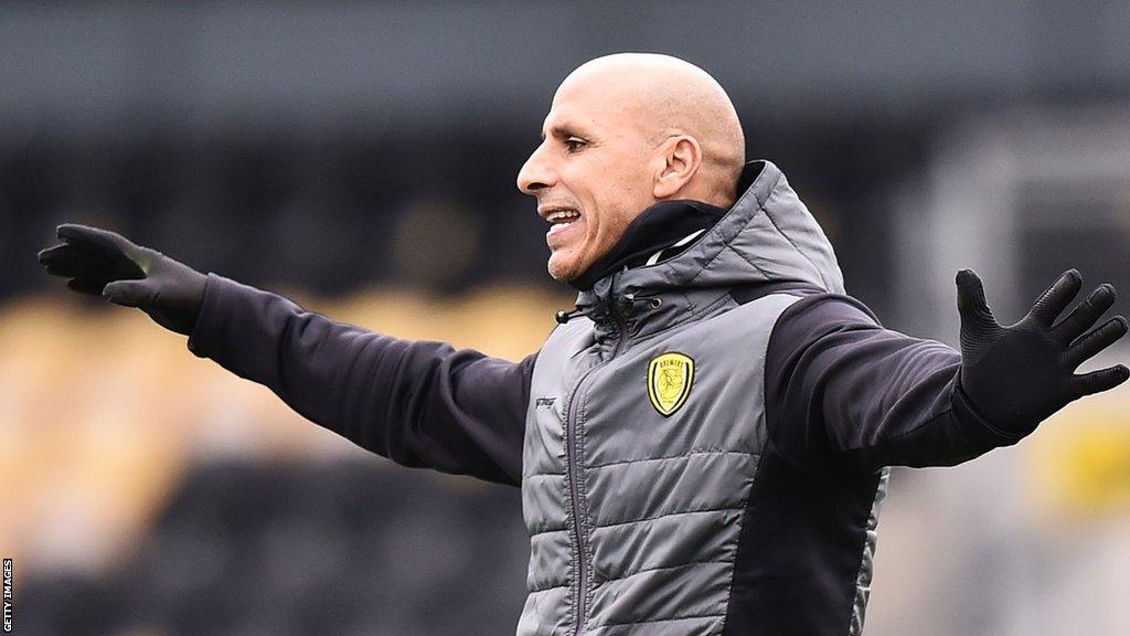 Burton boss Dino Maamria on the touchline