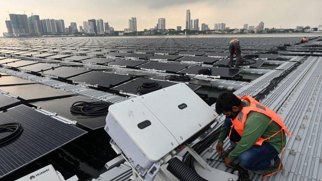 Floating solar panel farm