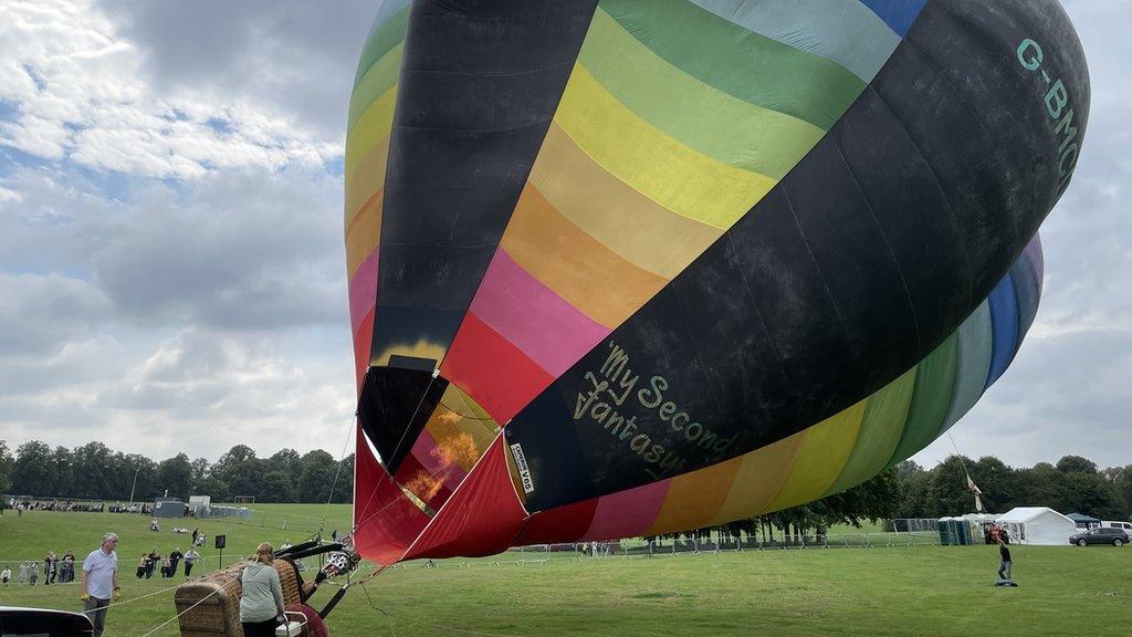 Tethered air balloon in field