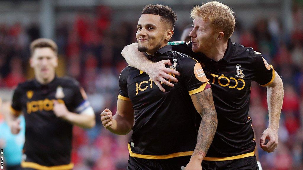 Tyler Smith (left) celebrates his goal