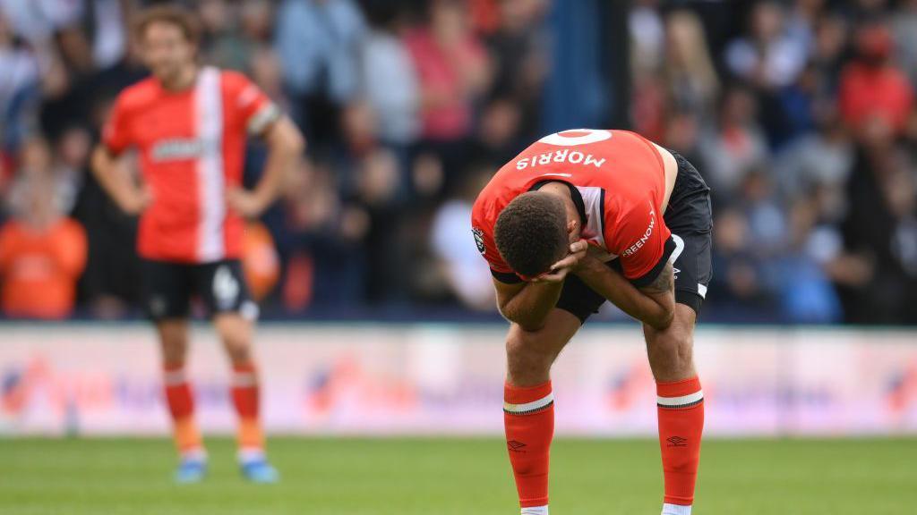 Carlton Morris of Luton Town reacts following the Premier League match between Luton Town and Wolverhampton Wanderers at Kenilworth Road