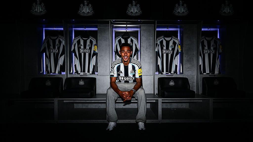 Jacob Ramsey poses during his Newcastle United signing day.